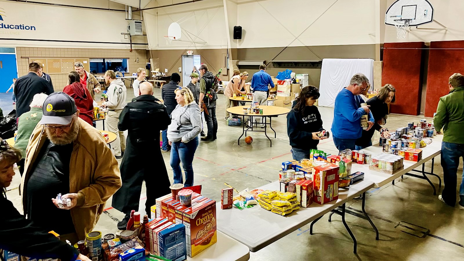 CASPER CHURCH AND SCHOOL COLLECTS FOOD TO SHARE FOR THANKSGIVING BASKET GIVEAWAY