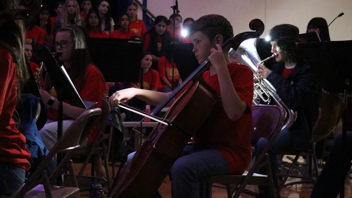 MUSIC FESTIVAL STUDENTS RAISE THEIR VOICES THROUGH THE DARKNESS